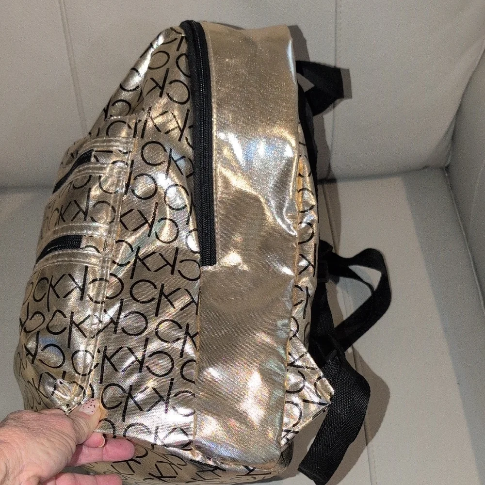 Calvin Klein Metallic Gold Backpack with Black Logo